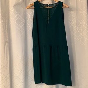 Green baby doll dress with hand stitching